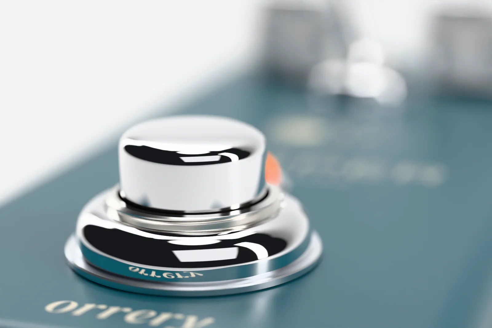 Macro of the chrome footswitch with shallow depth of field